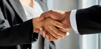two people shaking hands